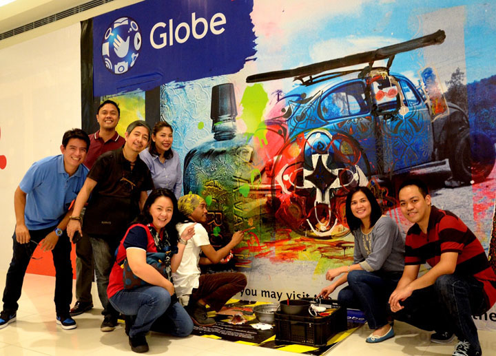 The Globe Store Retail Transformation team together with artist Ross Capili