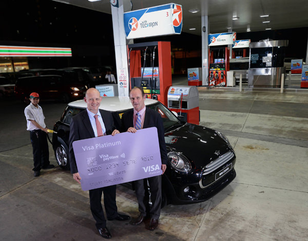 Peter Morris, Chevron Philippines Inc. Country Chairman and General Manager for  Philippine products and Stuart Tomlinson, Visa Country Manager for the Philippines  and Guam officially launch the Caltex-Visa Mini Promo.