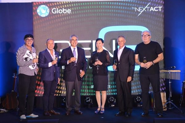 Leading a toast to open the new Globe Gen3 Store in Greenbelt were Ayala Corporation and Globe Chairman Jaime Augusto Zobel de Ayala (3rd from left) together with Singtel Group CEO Ms. Chua Sock Koong (3rd from right), Singtel Chairman Simon Israel (2nd from right), Head of Stores and Retail Transformation Management Joe Caliro (Leftmost), Globe President and CEO Ernest Cu (2nd to the left) and GEN3 Store designer and Founder and CEO of Eight, Inc. Tim Kobe (rightmost) 