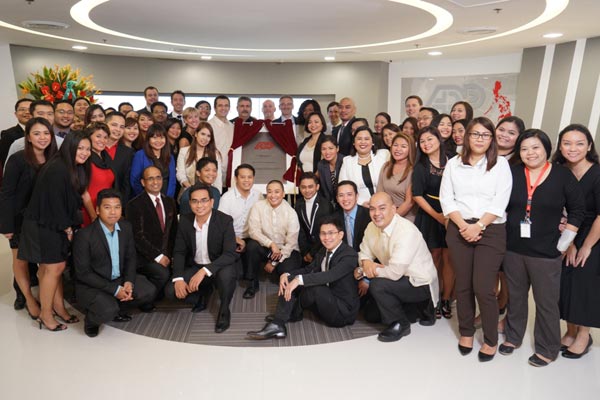 ADP Philippines associates and leaders celebrate the inauguration of the company’s expansion in Aeon Centre, Alabang