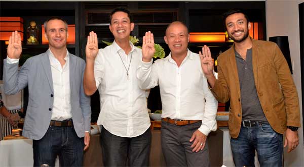 Globe President and CEO Ernest Cu (2nd from right) and De La Salle-College of Saint Benilde President Br. Dennis Magbanua FSC (2nd from left) flash the Benilde sign during the partnership agreement signing between Globe Telecom and De La Salle-College of Saint Benilde, enabling the school access to the telco’s Brightspace Learning Management System. Joining them are D2L Senior Channel Sales Manager David O’Hagan (leftmost) and Globe Head of Sales Engagement for Globe Education Solutions Bobby Khan (rightmost).