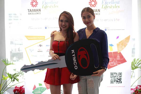 Maja Salvador with winner Micah Llona. Micah brought home a KYMCO motorcycle and PHP 50,000.00 cash prize.
