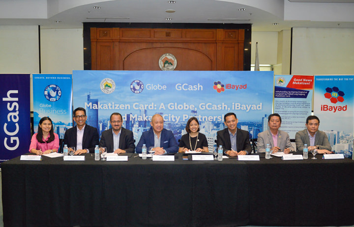 Left to right In the seated photo: Makati City Vice Mayor Monique Lagdameo; SVP for Enterprise Peter Maquera; Chief Commercial Officer Albert de Larrazabal ; Globe President and CEO Ernest Cu; Makati City Mayor Abby Binay; GXI President Abet Tinio; Makati City Administrator Claro Certeza; iBayad CEO Paulo Saycon.