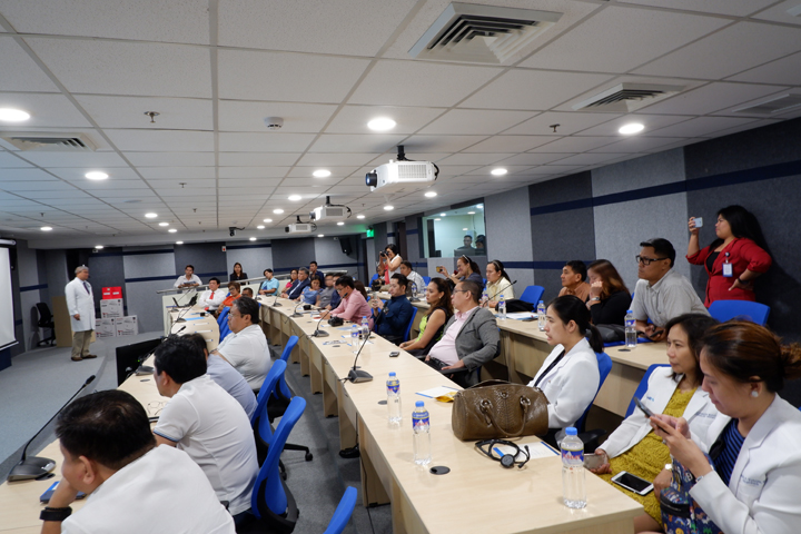 Print media, online bloggers, Qualimed-STR executives and medical professionals being attentive during the briefing of the PCI technology.