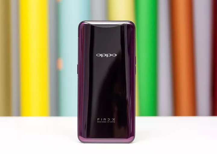 The OPPO Find X (6.4-inch OLED display, Snapdragon 845, 8GB RAM, up to 256 ROM, 3730 mAh battery with VOOC fast wired charging, Android 8.1 Oreo with Color OS) achieves a 92.25 percent screen to body ratio by hiding the front and rear cameras in a motorized slide out panel on top of the phone.