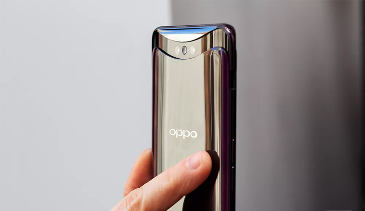 The OPPO Find X (6.4-inch AMOLED display, Snapdragon 845, 8GB RAM, up to 256GB ROM, 3730 mAh battery with VOOC fast wired charging, Android 8.1 Oreo with Color OS) achieves a 93.8 percent screen to body ratio by hiding the front and rear cameras in a motorized slide out panel on top of the phone.