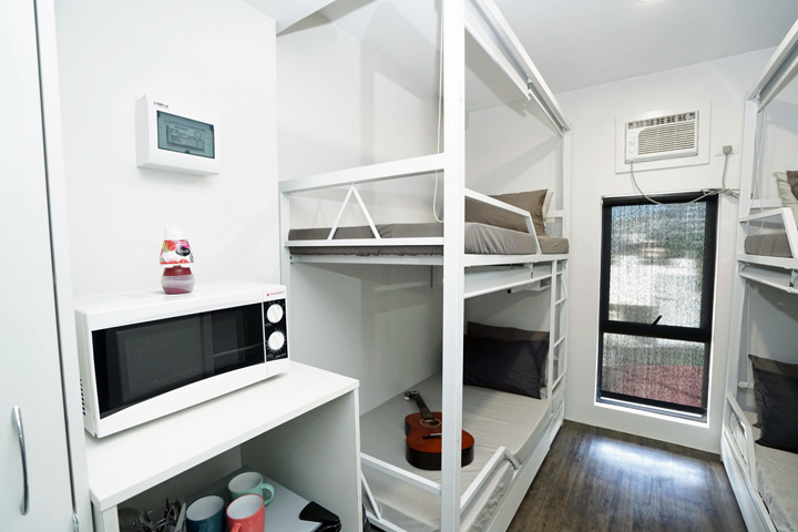 The 4-bedroom unit: MyTown offers co-living solutions for groups. This arrangement also comes with its own microwave oven, mini-fridge, bathroom and closet.