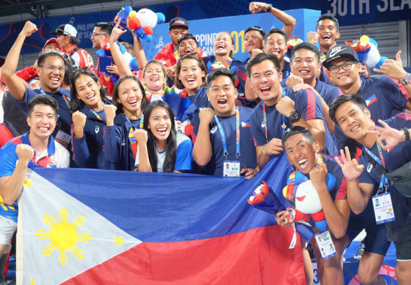 Sports enthusiasts and volleyball fans cheer for the Philippines finest athletes competing at the SEA Games in Manila