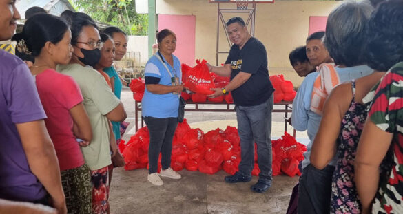 PLDT and Smart distribute relief aid to barangays in Camarines Sur
